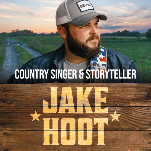 Country singer with road behind him